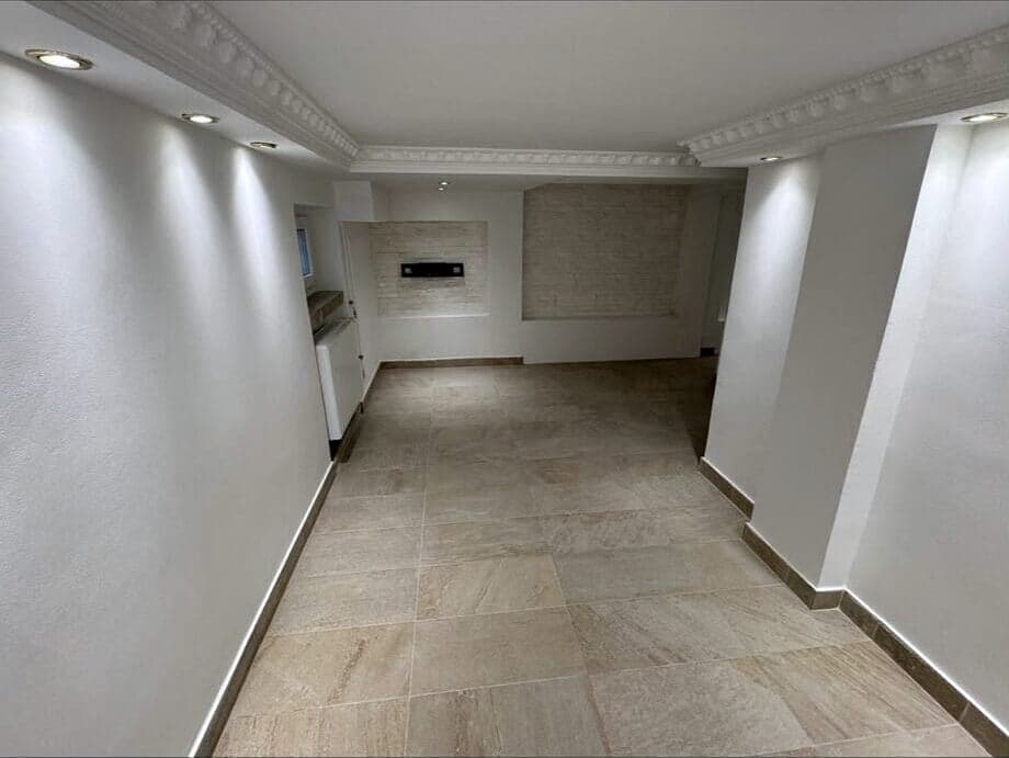 Basement room with indirect LED lighting