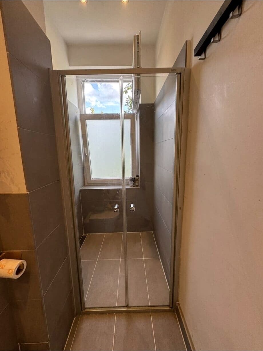 New shower with glass enclosure